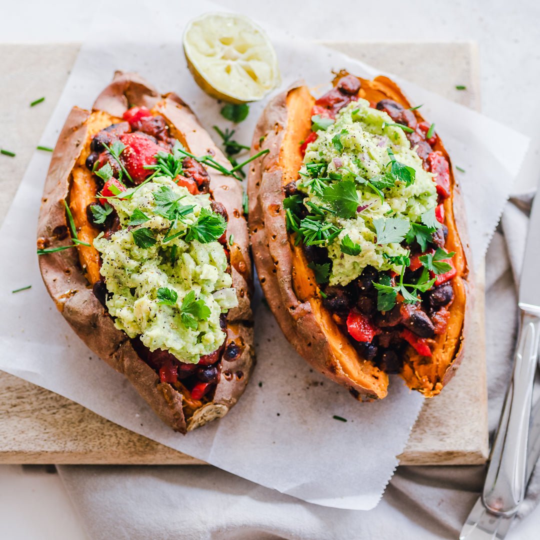 Black Bean Chili And Guacamole Stuffed Sweet Potatoes - TRANSFORM by Fitaz