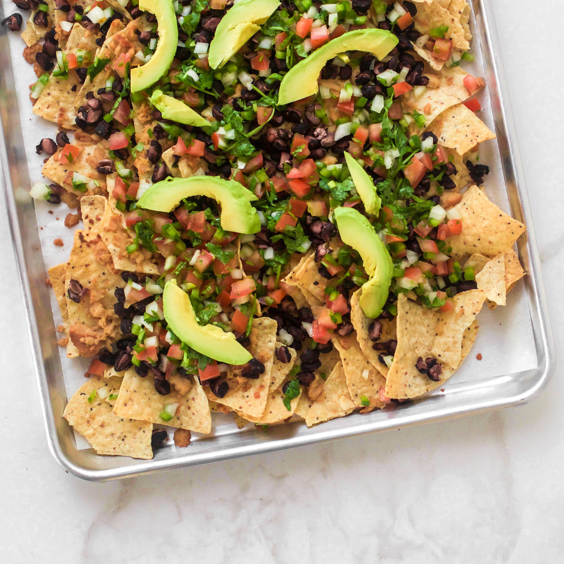 A Fiesta of Flavour and Crunch: The Ultimate Vegan Nachos! - TRANSFORM by Fitaz