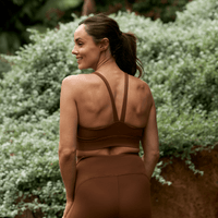 Flow Sculpted Crop Cinnamon lifestyle - warm-toned Pilates and yoga crop top - Transform by FitazFK